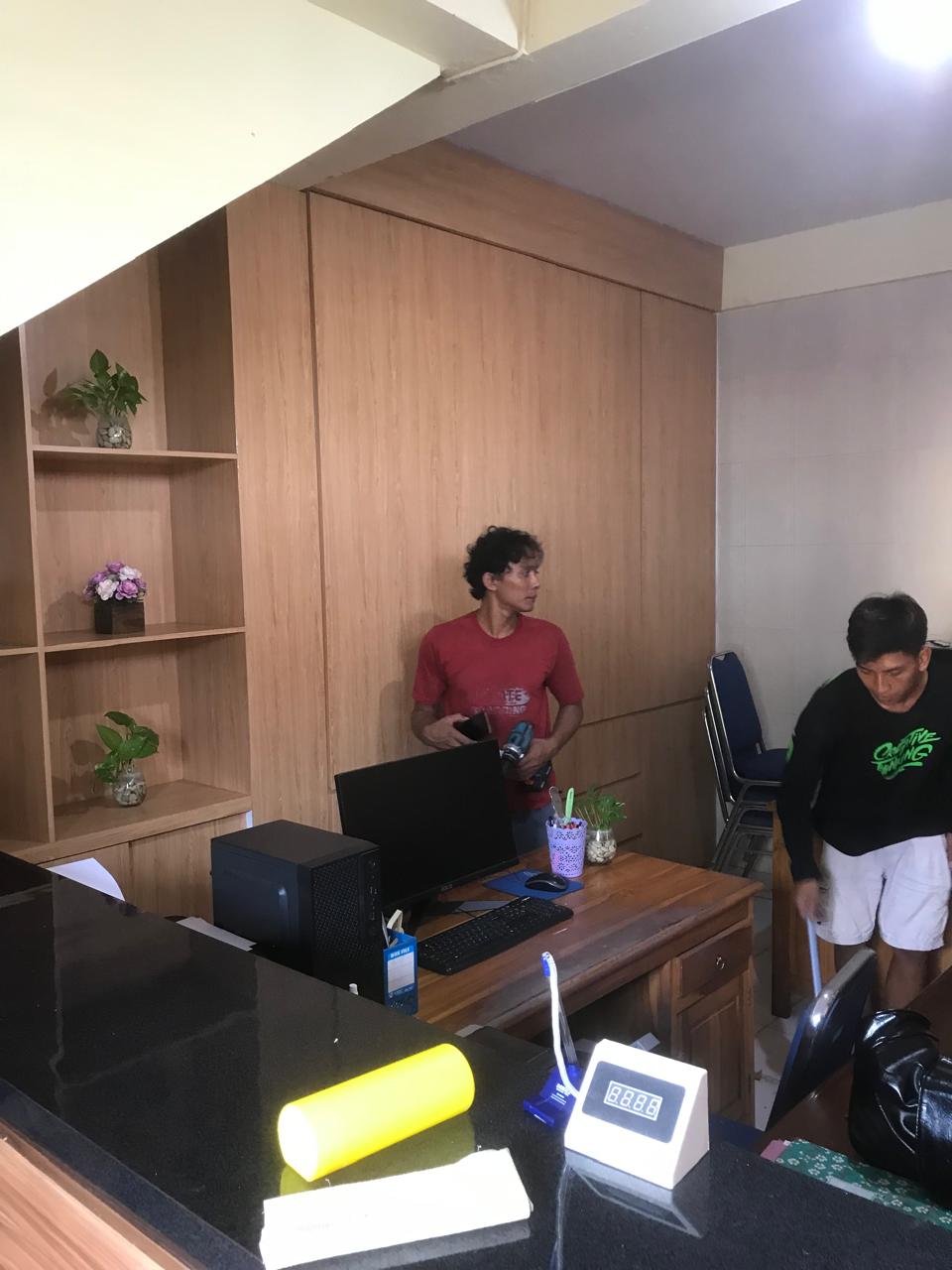 Minimalist office desk with built-in storage and ergonomic chair